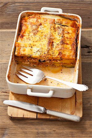 Moussaka with courgettes, potatoes and minced meat Stock Photo - Premium Royalty-Free, Code: 659-08418885