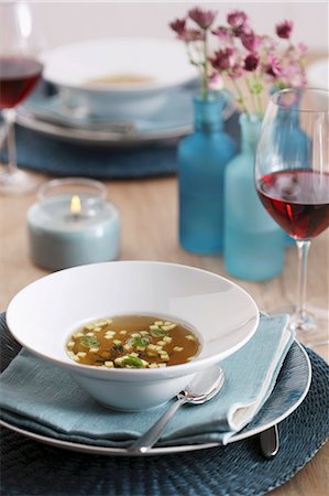 Clear beef broth with garnishes Stock Photo - Premium Royalty-Free, Code: 659-08418918