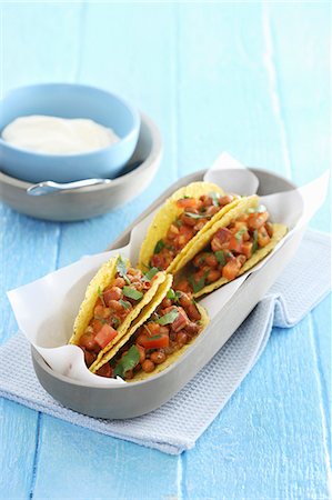 snack dish - Tacos with beans and sour cream Stock Photo - Premium Royalty-Free, Code: 659-08418950