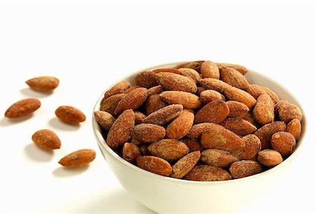 simsearch:659-07609880,k - A bowl of sweet roasted almonds Stock Photo - Premium Royalty-Free, Code: 659-08418991