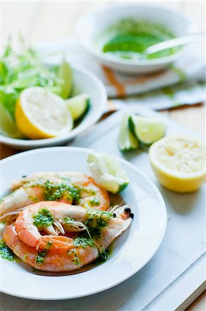 shrimp & sauce - King prawns with pesto and lemons Stock Photo - Premium Royalty-Free, Code: 659-08419013