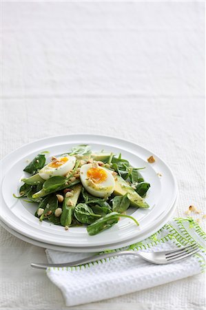 Spinach salad with avocado and boiled-egg Stock Photo - Premium Royalty-Free, Code: 659-08419187