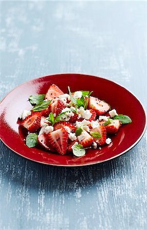 fruitsalad - Strawberry salad with feta cheese, mint and black sesame seeds Stock Photo - Premium Royalty-Free, Code: 659-08419182