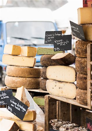 Various cheeses on a market stall Stock Photo - Premium Royalty-Free, Code: 659-08419261