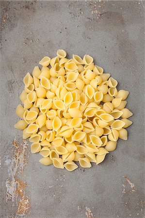 simsearch:659-06186698,k - A pile of conchiglie rigate pasta Stock Photo - Premium Royalty-Free, Code: 659-08419364