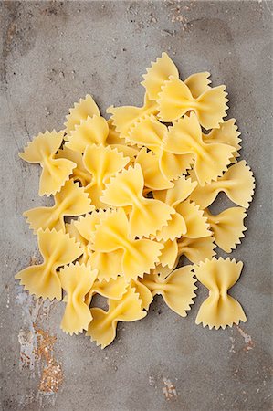 simsearch:659-03533452,k - A pile of farfalle pasta Stock Photo - Premium Royalty-Free, Code: 659-08419367