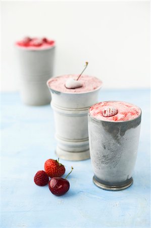 Strawberry ice cream, cherry ice cream and raspberry ice cream in metal cups Stock Photo - Premium Royalty-Free, Code: 659-08419440