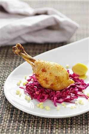 simsearch:659-03535438,k - Roast chicken leg with red cabbage Stock Photo - Premium Royalty-Free, Code: 659-08419569