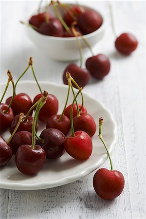 shabby chic - Cherries on white background Stock Photo - Premium Royalty-Free, Code: 659-08419637