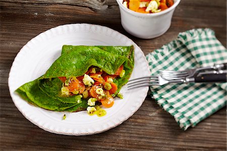 simsearch:659-06151520,k - Spinach pancakes with a feta and carrot medley Stock Photo - Premium Royalty-Free, Code: 659-08419764