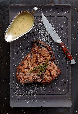 fillet steak - Grilled T-bone steak with gravy Stock Photo - Premium Royalty-Free, Code: 659-08420121