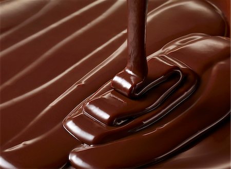 simsearch:659-06903385,k - Melted chocolate Foto de stock - Royalty Free Premium, Número: 659-08420351