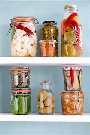 Various jars of preserved vegetables on a shelf Stock Photo - Premium Royalty-Free, Code: 659-08513069