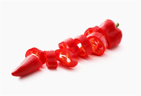 simsearch:659-06154338,k - A sliced red pepper Foto de stock - Sin royalties Premium, Código: 659-08513249