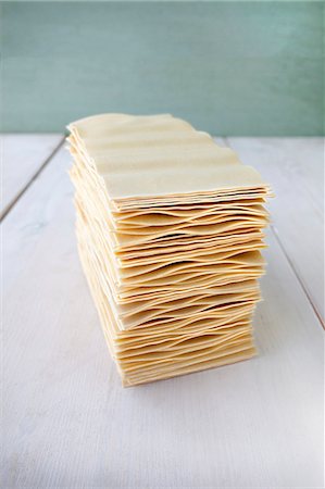 pasta type - A stack of lasagne sheets Stock Photo - Premium Royalty-Free, Code: 659-08895284