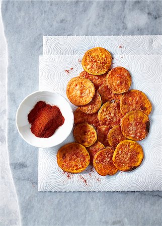 sweet potatoes raw - Sweet potato chips baked with parmesan Stock Photo - Premium Royalty-Free, Code: 659-08895629