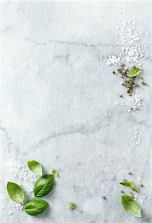 simsearch:659-08906139,k - Basil leaves, sea salt and green peppercorns on a marble platter Stock Photo - Premium Royalty-Free, Code: 659-08895620