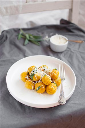 squash recipe - Pumpkin gnocchi with sage, butter and parmesan Stock Photo - Premium Royalty-Free, Code: 659-08895818