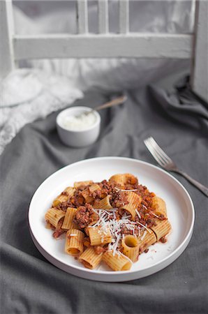 Mezze rigate with bolognese ragu and grated parmesan Stock Photo - Premium Royalty-Free, Code: 659-08895813