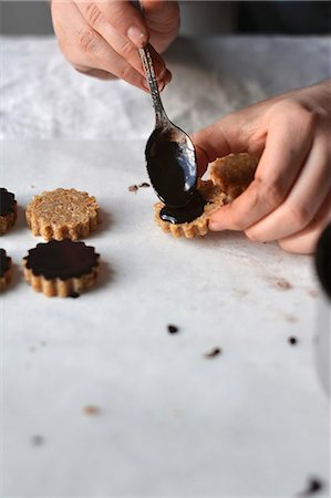 Raw vegan oat cookies with a chocolate glaze Stock Photo - Premium Royalty-Free, Code: 659-08896136