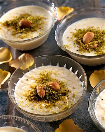 Rice pudding with pistachios and almonds Stock Photo - Premium Royalty-Free, Code: 659-08896172