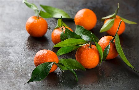 simsearch:659-07739607,k - Several tangerines with leaves Stock Photo - Premium Royalty-Free, Code: 659-08896264