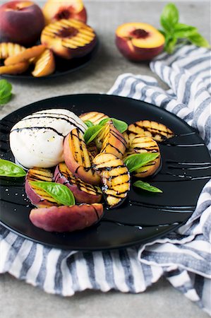 Grilled Peach Mozzarella Salad Stock Photo - Premium Royalty-Free, Code: 659-08896389