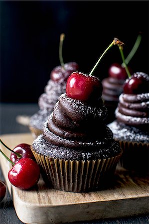 stone fruit - Chocolate cupcakes with cherries Stock Photo - Premium Royalty-Free, Code: 659-08896381