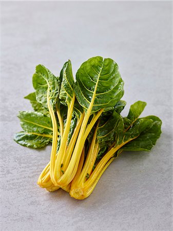 simsearch:659-06153727,k - Fresh, yellow-stemmed chard on a grey background Stock Photo - Premium Royalty-Free, Code: 659-08896757