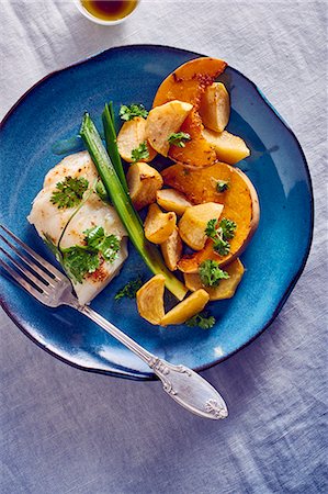Cod fillet with pumpkin wedges and potatoes Stock Photo - Premium Royalty-Free, Code: 659-08896921