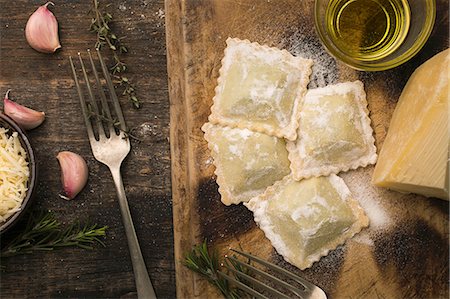 raw ingredients on board - Handmade ravioli stuffed with parmigiano cheese and chicken Stock Photo - Premium Royalty-Free, Code: 659-08896942