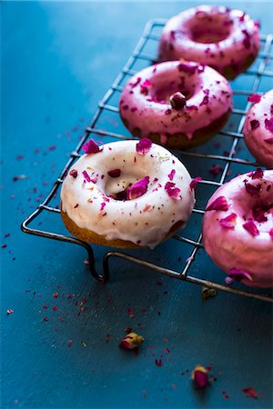 pink donut studio shot - Donuts with roses Stock Photo - Premium Royalty-Free, Code: 659-08897040