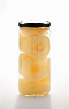 simsearch:659-08896093,k - Preserved pear halves in a jar Foto de stock - Sin royalties Premium, Código: 659-08897099