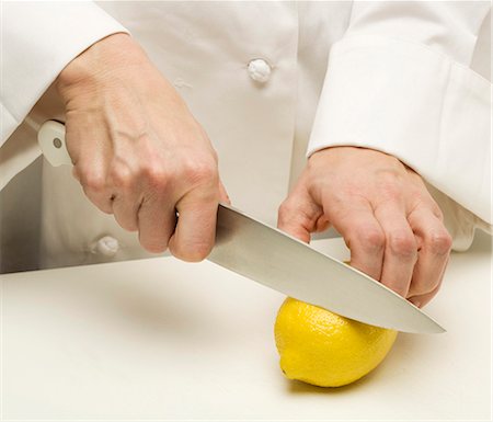 slicing fruit - Lemon Stock Photo - Premium Royalty-Free, Code: 659-08897248