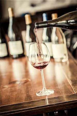 simsearch:659-07599188,k - Red wine being poured into a glass Stock Photo - Premium Royalty-Free, Code: 659-08897326