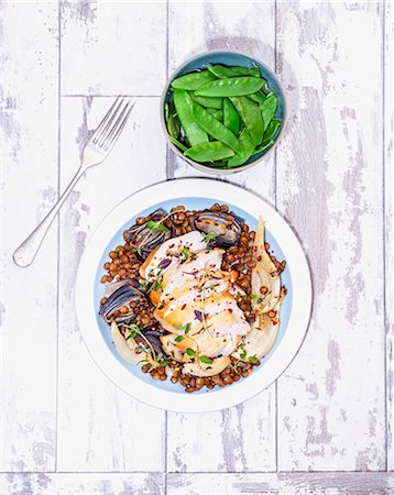 Chicken breast with a lentil medley and chilli served with mange tout Stock Photo - Premium Royalty-Free, Code: 659-08904114