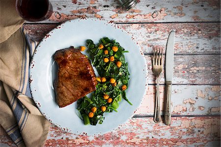 Beef steak with a chickpea and spinach medley Stock Photo - Premium Royalty-Free, Code: 659-08904137