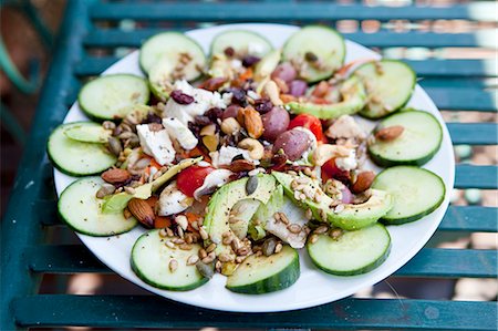 Cucumber salad with avocado, cashew nuts, seeds and olives Stock Photo - Premium Royalty-Free, Code: 659-08904251