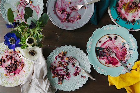 Left over blueberry pie on various plates Stock Photo - Premium Royalty-Free, Code: 659-08904266