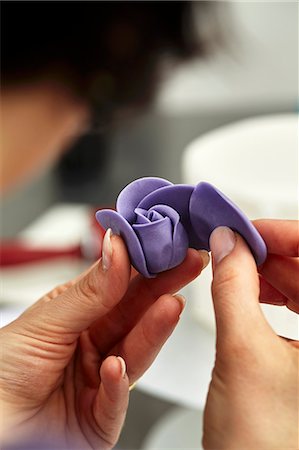 A confectioner making a marzipan flower Stock Photo - Premium Royalty-Free, Code: 659-08904527