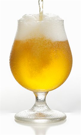 poured beer - A beer being poured into a Pils glass Stock Photo - Premium Royalty-Free, Code: 659-08904564