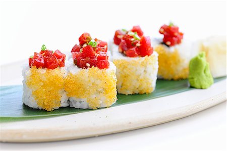 simsearch:693-06403356,k - Ura-maki with tomato coulis and flying fish roe Stock Photo - Premium Royalty-Free, Code: 659-08904832