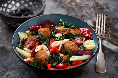 Pasta salad with meat balls, grilled peppers and savoy cabbage Stock Photo - Premium Royalty-Free, Code: 659-08904854