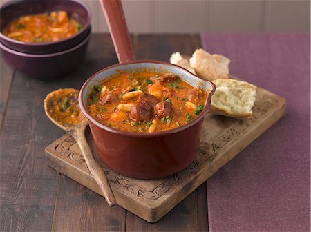 stew sausage - Chorizo soup in a pan Stock Photo - Premium Royalty-Free, Code: 659-08904892