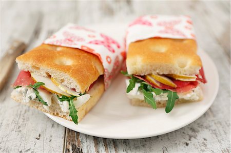 simsearch:659-07027045,k - Focaccia sandwiches with tomato, cheese, rocket and turkey breast Stock Photo - Premium Royalty-Free, Code: 659-08905149