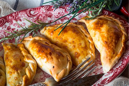 simsearch:659-08940611,k - A plate of Spanish pasties filled with meat and tuna Stock Photo - Premium Royalty-Free, Code: 659-08905498