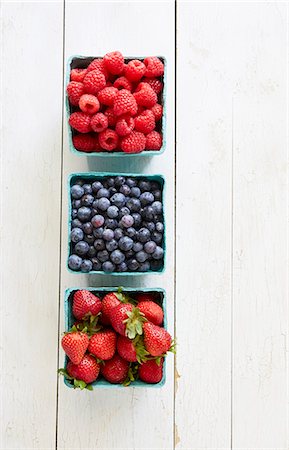 simsearch:659-07959114,k - Raspberries, blueberries and strawberries in cardboard punnets Stock Photo - Premium Royalty-Free, Code: 659-08905569