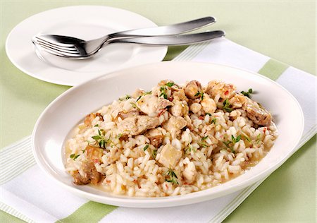 southern european - Risotto con faraona (Italian guinea fowl risotto) Stock Photo - Premium Royalty-Free, Code: 659-08905578