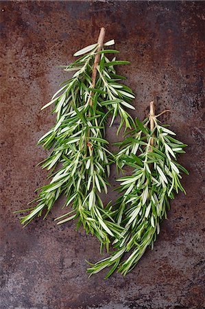 simsearch:659-08419561,k - Fresh sprigs of rosemary on a metal surface Stock Photo - Premium Royalty-Free, Code: 659-08905602