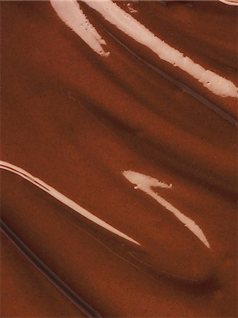 Melted chocolate (close-up) Stock Photo - Premium Royalty-Free, Code: 659-08905754